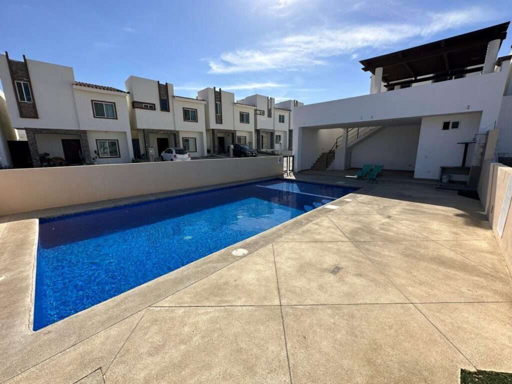 San Jose del Cabo Monte Real Turnkey Investment Opportunity in Monter Real, Welcome to Monterreal, a beautifully maintained gated community offering comfort, security, and exceptional value. This fully furnished and equipped two-story home features 3 spacious bedrooms, 2.5 bathrooms, mini-split air conditioning. The open-concept living and dining areas flow seamlessly into a well-appointed kitchen, while the generously sized bedrooms provide comfort and privacy for family and guests. The primary suite includes a walk-in closet and en-suite bathroom. enjoy access to a beautiful swimming pool, common recreational areas, and a peaceful neighborhood atmosphere. – 8 Paseo, La Jolla, San Jose del Cabo, BS